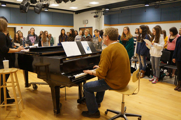 Martin Sirvatka plays a tune for South students to sing to. Photo by Jackie Cortopassi.