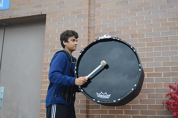 Drumming Dude: While marching in band practice, freshman Amil Dravid scans ahead towards his fellow drumline mates to stay in formation. 
Photos courtesy of Amil  Dravid