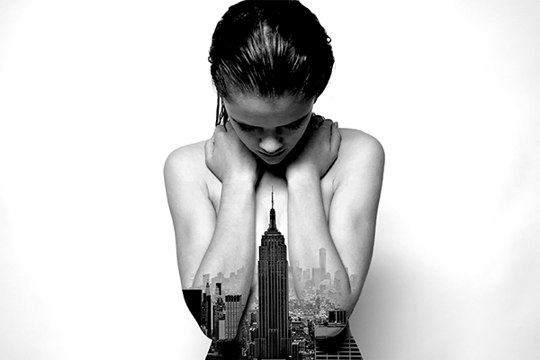 SKIN AND SKYLINE: Bearing the New York City skyline, freshman Kirsten Sully models in senior Tayor Raschillo’s IHSAE-featured photograph. The photo mixes her model and a picture from her trip to New York City. 
