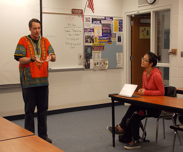 WHIPPLE’S WISE WORDS: Speaking to his AP World class, Matthew Whipple leads a dicussion that includes a balance of current events and topics outlined in the world history curriculum. Whipple takes many of the themes from this class and applies them to STAND For Peace (STAND), the international service club that he has sponsored for over 10 years. 