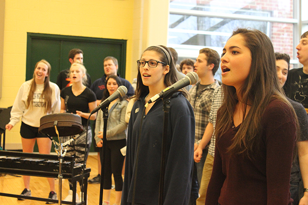 ANCIENT ARTS: Practicing for their roles in Aida, senior Rory Penepacker and sophomore Ashley Levenson sing ”Gods of Nubia.” Penepacker plays Aida, the Nubian slave, and Levenson plays Nehebka, another Nubian girl. 