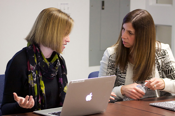 FAGEL ‘N FRIENDS: Having a discussion with Lara Cummings, assistant principal for student services, Principal Lauren Fagel spreads awareness for gender inclusivity at a Gender in Schools committee meeting. The committeeís event on April 12 was the first of many that the committee hopes will foster a welcoming environment for all gender identities.