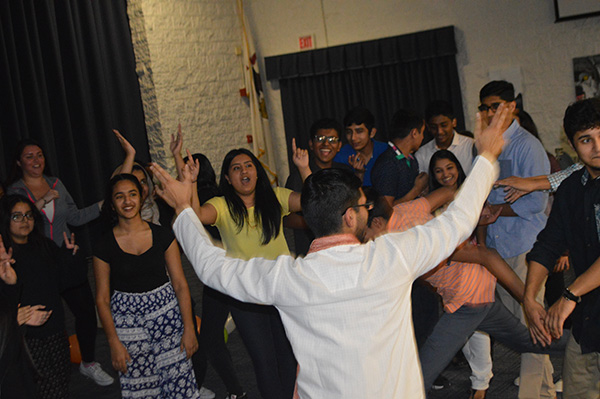 DESI DANCE: Attracting the attention of other dancers, senior Jeffery Kurian’s energy spreads enthusiasm amongst his peers as they dance to Bollywood music. Desi Club hosted its first Bollywood dance night to fundraise for a non-profit school in New Delhi and Dara Dune, India.