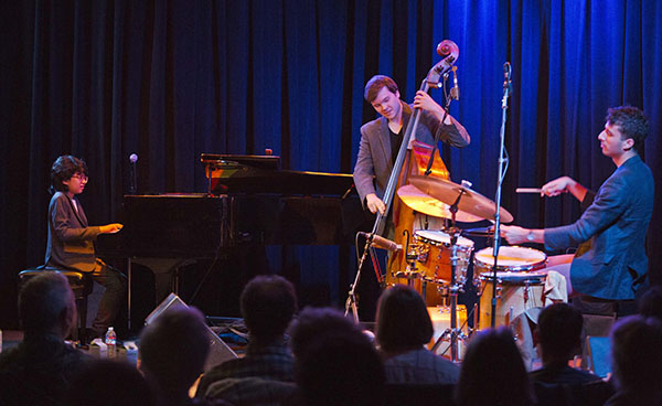 BASS BOY: Strumming the strings on his bass, South alumnus Dan Chmielinski performs alongside his bandmates in their group entitled “The Joey Alexander trio.” The trio performed at Kuumbwa Jazz, a concert venue in Santa Cruz, California.  