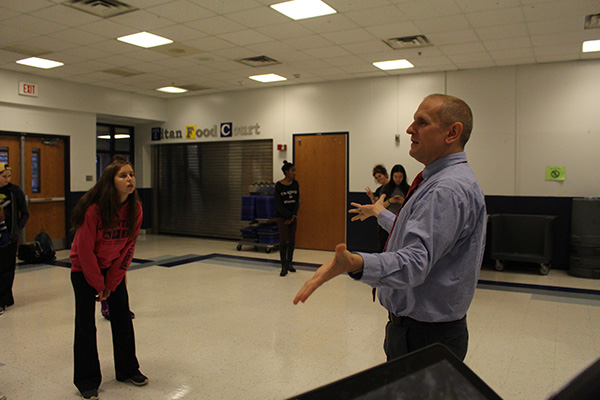 Mirroring Maranto:  Leading members in the Freshman and Sophomore Play rehearsal, Mark Maranto, Fine Arts instructional supervisor, provides his insight for the direction of the opening scene. One of Maranto’s goals in this new position is to integrate the added classes with existing traditions.