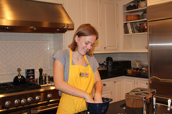 KATES  KITCHEN:  Kneading the dough for buttermilk biscuits, junior Kate Voss prepares a classic dinnertime staple in her kitchen at home. Voss has been involved in the culinary program at South since her freshman year, and also runs her own catering business, called ‘Katering’, outside of her involvement at school