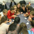 Breaking the Ice: Huddling in a circle, South freshmen and their senior Peer Group leaders gather together during their designated Peer Group block. As a group, they work to form new friendships through teambuilding and get-to-know you games.