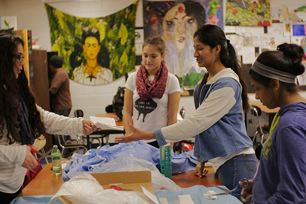 HANDING HOPE: Preparing for an art project on facial expressions using ceramic masks, members of Students Organized Against Racism (SOAR) discuss the impact of racism in their communities. The club hopes to utilize personal stories to make members feel more comfortable talking about race and the problems surrounding racial identity. 