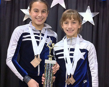 Hartley sisters continue to inspire each other in gymnastics