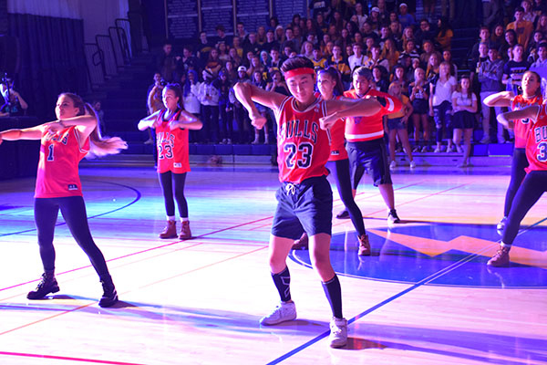 KILLER KIM:  Senior co-captain Eden Kim helps lead the De La Cru team at the Pep Rally. Kim and fellow co-captain Chloe McKerr say they are attempting to develop new styles for the team this year.