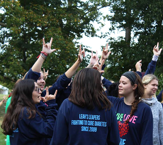 WORTH THE WALK:   Celebrating as a team, Dunne’s Juvenile Diabetes Research Foundation walk team raised $3000 on Oct. 1. Dunne has been participating in the walks for eight years and has raised over $30,000 in total for juvenile diabetes research. Photo courtesy of Leah Dunne