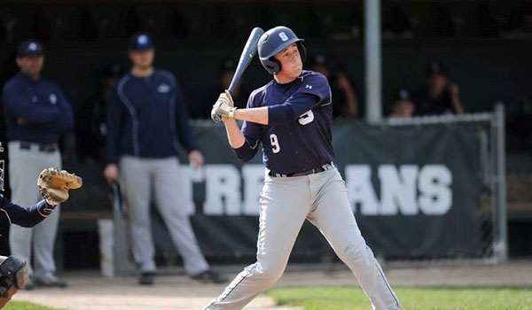 Swingin Stud: Senior Jacob Newman takes a hit for the Glenbrook South Titans. Newman will play divison 1 baseball next fall at Rutgers University. 