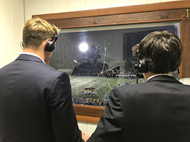 broadcast  partners:   Looking over and observing the Titan’s home opener against Palatine, broadcast partners Henry Schleizer and Michael Poulton call the action for listeners. Schleizer’s passion for                	broadcasting was influenced from a young age by watching Bears football and Chicago sports.  Photo courtesy of Henry Schleizer