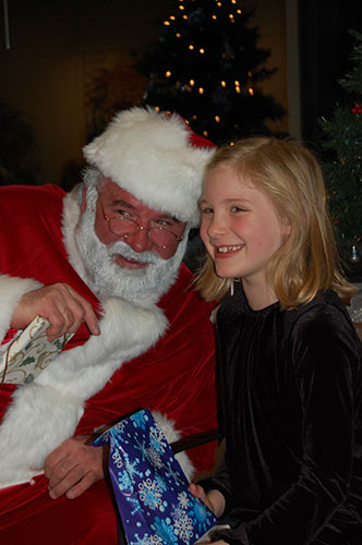 Smiling with Santa Claus (left), the Easter Bunny (center) and her younger sister (right), Gwyn Skiles celebrates Christmas and Easter as a young child. Much of Skiles’s fun and festivity during the holidays came from her belief in these mythological characters, which she maintained through the age of eight. 