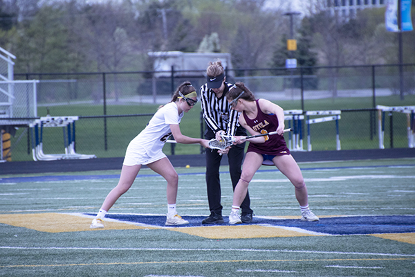 Raging Rivals:   Starting off the game, sophomore Meghan Bireley faces off against Souths’ rival Loyola. The team wasn’t able to secure a win and lost 16-6, however, they have since had a winning record of 15-4 this season, according to Head Coach Annie Lesch.