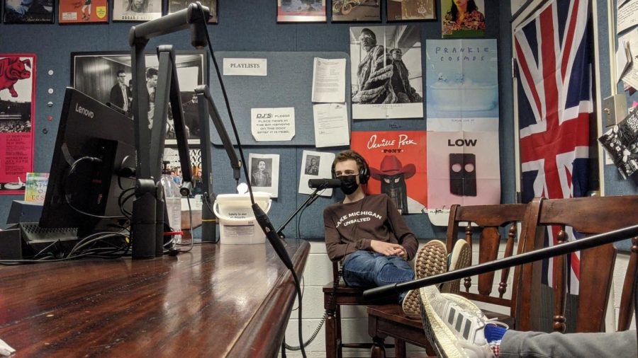 Moments that matter: Recording his sports talk show, Marquardt sits in South’s radio studio  hours after school. For Marquardt, South’s radio program has been an outlet for him to enjoy all that the school had to offer for him as a student. Photo courtesy of Tommy Marquardt