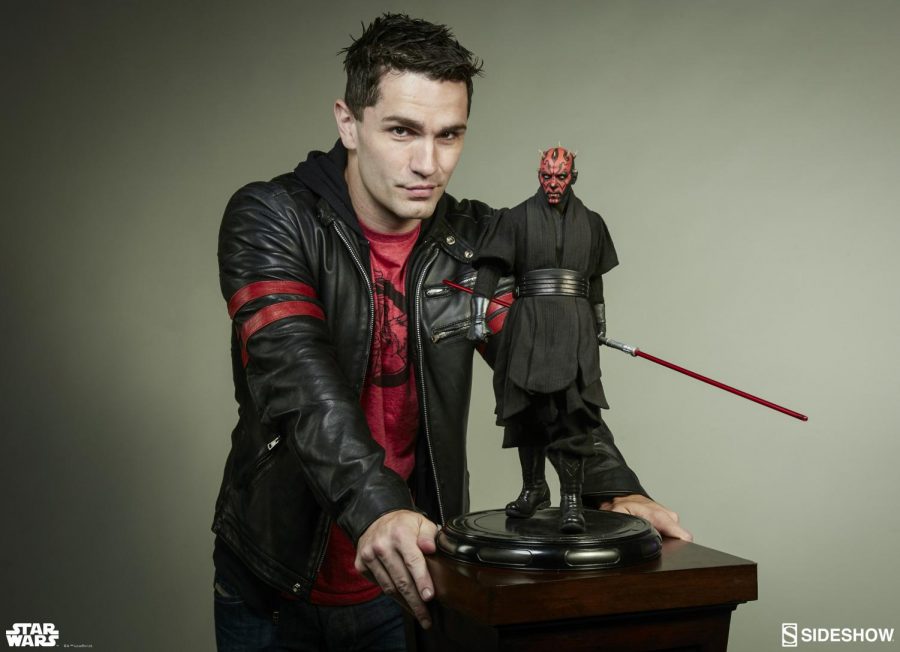 Sith Lord Sam: Posing for the camera, South alumnus Sam Witwer stands next to a figurine of Darth Maul from the Star Wars movie franchise. Witwer voices this character in Star Wars: The Clone Wars. Photo courtesy of Sam Witwer