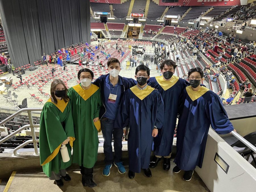 Marvelous musicians:  Posing for a photo (left to right) North students seniors Abby Rench and Changwoo Yu and South students senior David Lukaszcyk, sophomore Andrew Yang, and juniors Peter Hitzeman and Anthony Tu, unite at the ILMEA state musical festival. 
Photo courtesy of Peter Hitzeman 