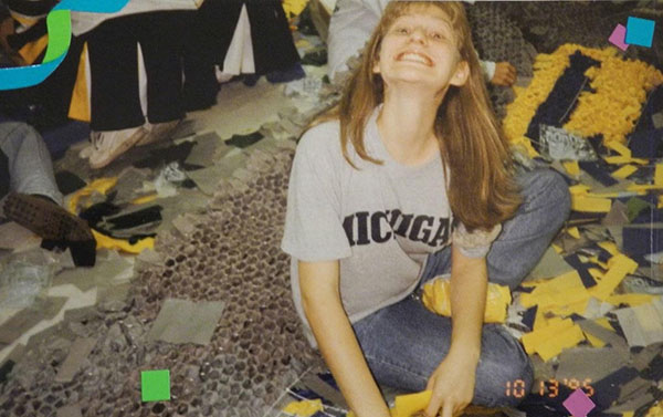 POMP AND PLAY: On the left, English teacher Katie Hoover leaps high into the air to block the ball. On the right, science teacher Deborah Stein works on float design for the South homecoming parade. Hoover and Stein were graduates of South in 2000 and 1995, respectively. 