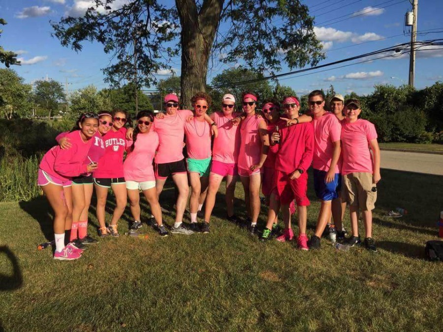 Seniors Lauren Frias, Stephen Sholty, George Tantchev, Colin Quill, Alex Sirakides and the rest of the drumline all participate in the color wars event during band camp. Band is one of many things Frias hopes to cherish throughout her last year at South. 