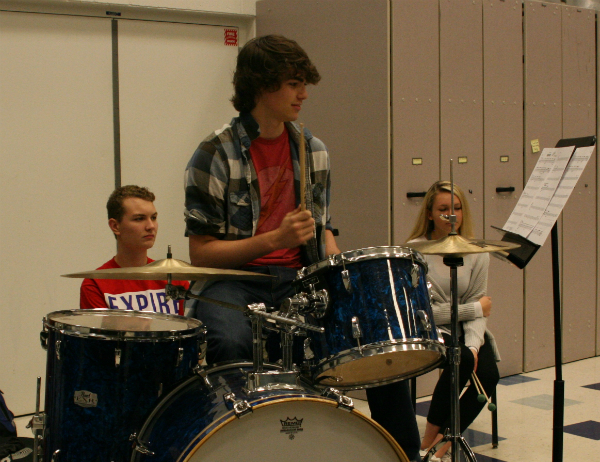 Tapping in time, Sholty drums with the rest of the jazz ensemble. Sholty performs in drumline, jazz band, and for IMEA.