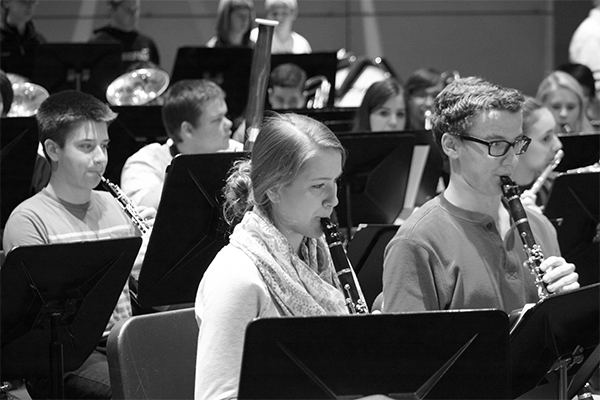 VACATION PREPARATION: Rehearsing various pieces of music, sophomore Erin Kirby and senior Marc Turenne play the clarinet to help the band determine which to perform in Hawaii. The band holds special rehearsals in order to prepare for their performance.