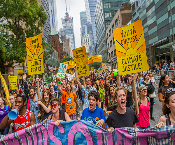 MARCHING FOR THE MOVEMENT: Over 40,000 people gathered in New York City in September 2014 to rally and protest for climate justice, making it the largest action on climate in history. The march was successful in changing the notion that climate does not affect our lives personally, a misconception that many South students are attempting to eliminate through increased discussion and awareness.  