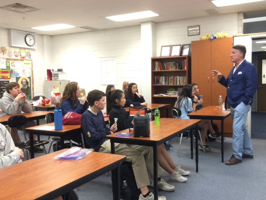 SERVICE WITH SHELLARD: Speaking to a class of Sophomore Honors English students, Dr. Jim Shellard, assistant principal of student activities, emphasizes the importance of serving others. Shellardís remarks set forth the celebration of the service research projects.