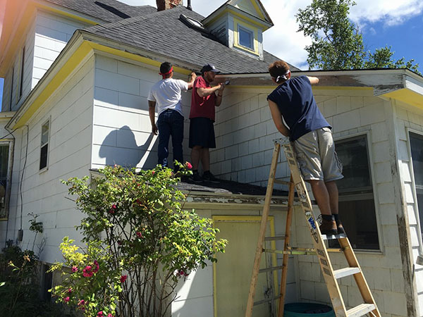 Painting a needy family’s house, Zach Cepeda, Harrison Kane and Reggie Lara take part in Habitat for Humanity. The program helps adults and kids build and refurbish houses for people in poverty. 

Photo courtesy of Zach Cepeda
