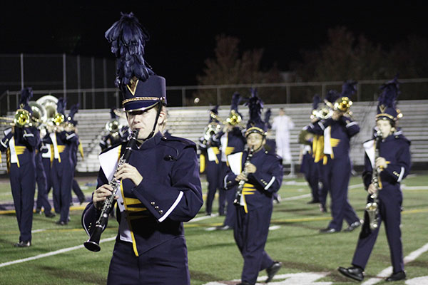 Erin in Action:  Playing a solo on her clarinet, junior Erin Kirby performs at Band-o-rama. At this event, the marching band played in front of parents and honored seniors with awards and speeches. 