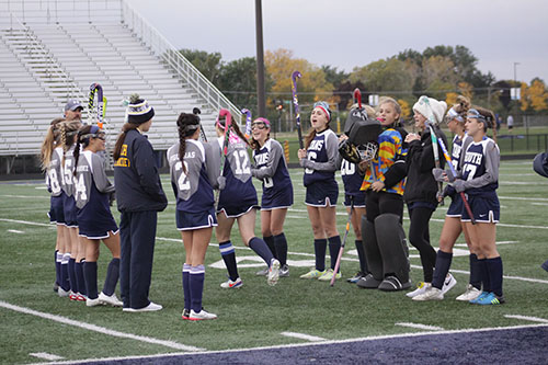 Women's sports teams develop support system with big and little