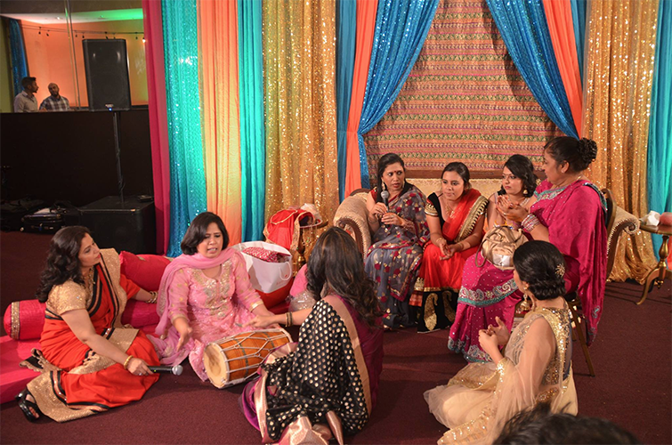 %0ACultural+customs%3A+Celebrating+a+cousin%E2%80%99s+wedding%2C+the+Kalra+family+women+take+part+in+the+tradition+of+singing+songs+that+welcome+the+groom+into+the+family+and+send+off+the+bride+into+a+happy+marriage.+This+generallly+occurs+on+the+second+night+of+the+wedding%2C+which+can+last+up+to+a+week.+Photo+courtesy+of++Anushka+Kalra