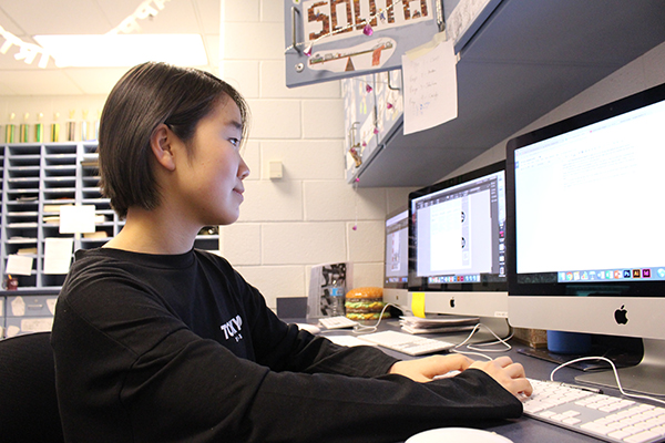 A way with words: Junior Gina Kim edits her essay on comfort women. This essay won Kim the Anti-Defamation League (ADL) award for the First Amendment Freedoms Art and Essay Contest.