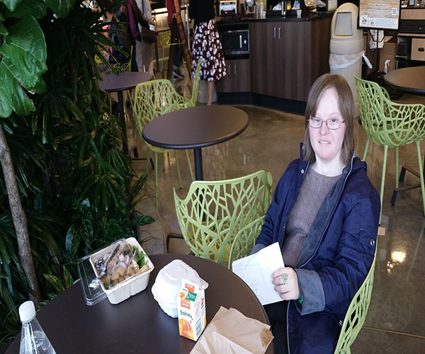 LUNCHIN’ LISA: Sitting down for a lunch break, senior Lisa Krupinski takes her weekly trip to the grocery store. She will be honored at the Council for Exceptional Children (CEC) conference in April for receiving the annual Yes I Can Award.