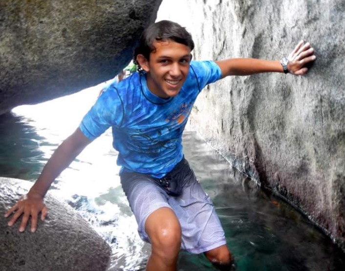 GEOLOGY GURU: Exploring a cavern in Baths National Park, senior Max Klemm learns about biology and geology in a two week summer camp. Klemm is one of many seniors who will use the summer to study their soon-to-be college major. Photo courtesy of Max Klemm