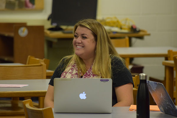 Bright Beckwith: Smiling in approval of the work of the GBS Model UN delegates, Nyssa Beckwith, social studies teacher, supervises the meetings activity.  Beckwith is the new adviser to the club after Terrence Jozwik retired last year.  