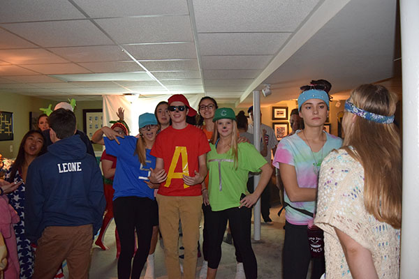 Young Life members pose for a picture at their halloween party.
