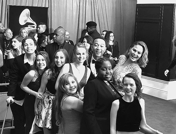    Posing with fellow Make-A-Wish recipients, junior Anna Shabelman (third from left) smiles with musician John Legend and model Chrissy Teigen. Shabelman suffers from kidney failure and was given the opportunity to attend the Grammys to fulfill her wish on Jan. 28. Photo courtesy of Anna Shabelman