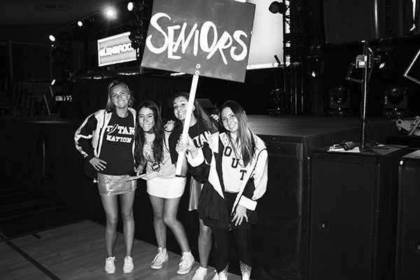 WINNIN’ WOMEN: Smiling at the 2018 Pep Rally, seniors Cat Berg, Abby Grant, Gracie Hambourger and Bebe Haramaras show their spirit. The four senior girls make up South’s first all-female executive board. Photo courtesy of Abby Grant