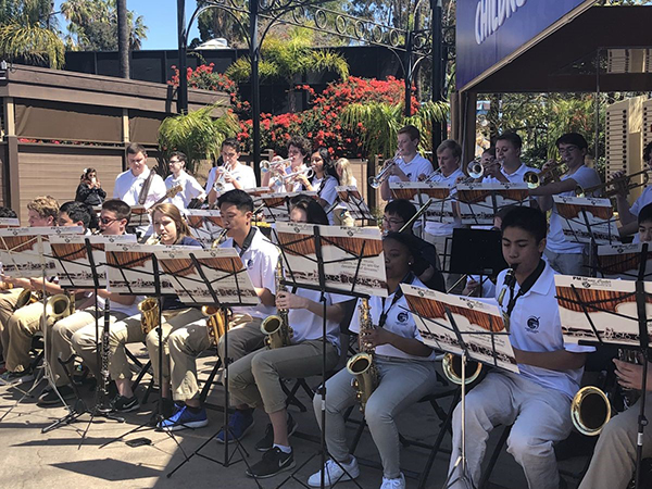 MASTERFUL MUSICIANS:   Focusing intently on their music, the GBS Jazz Band plays at the San Diego Zoo. Along with the zoo, the band played at a number of San Diego landmarks including the USS Midway and the Spreckels Organ Pavilion, according to co-band Director Aaron Wojcik. 