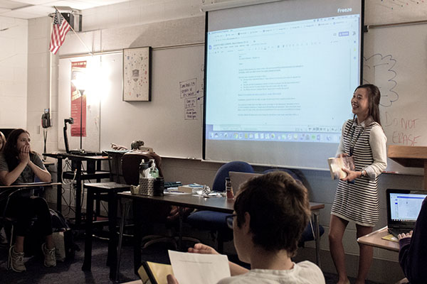 Fresh Faces: Presenting to her sophomore English class, new teacher Jen Jun teaches a lesson on fables. Glenbrook South hired 11 new staff members this school year. 