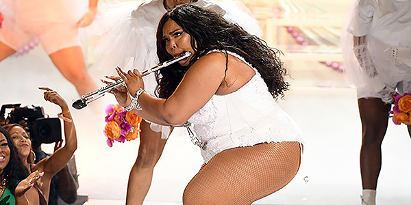 Loving Lizzo: Playing her flute at the BET awards, Lizzo flaunts her musical talents. Her flute can be found in multiple songs throughout her album. 