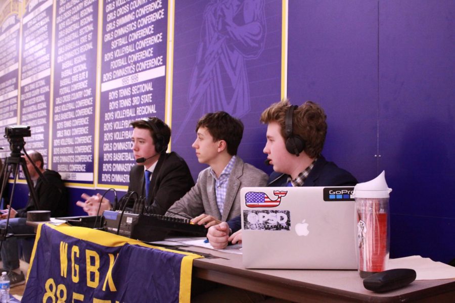 On air action: Bruce Klosa, Jonas Evans and Bryce Gaubert, junior radio commentators, announced the boys’ basketball game on Dec. 13. As the game continued, they described the game play-by-play and gave analysis. Photo by Nicole Surcel