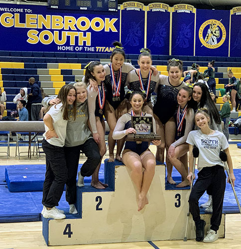 Triumphant gymnasts: Leaping through the air to the left and flipping to the right, junior Elena Pauker, competes on beam at the CSL girls’ gymnastics varsity meet. After the conference meet ended, the varsity gymnasts celebrated their victory on the podium, as featured in the center. Photos by Nicole Surcel (left and right) and courtesy of  Bob Szafranski (middle)