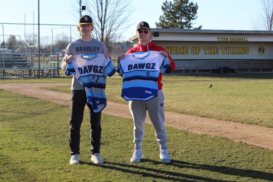 Baseball best friends: Beaming under the March sun, Cole Luckey (left) and George Korompilas (right) hold out their childhood baseball jerseys with their home varsity field behind them. 
