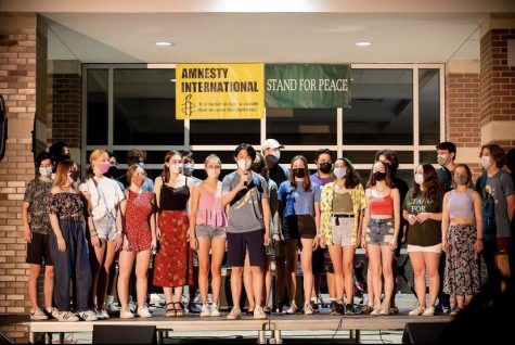 Skilled singers: During the 2021 Jamnesty show, Chamber Singers performs outside in the Autos Courtyard. 
Photo courtesy of Samantha Glaser