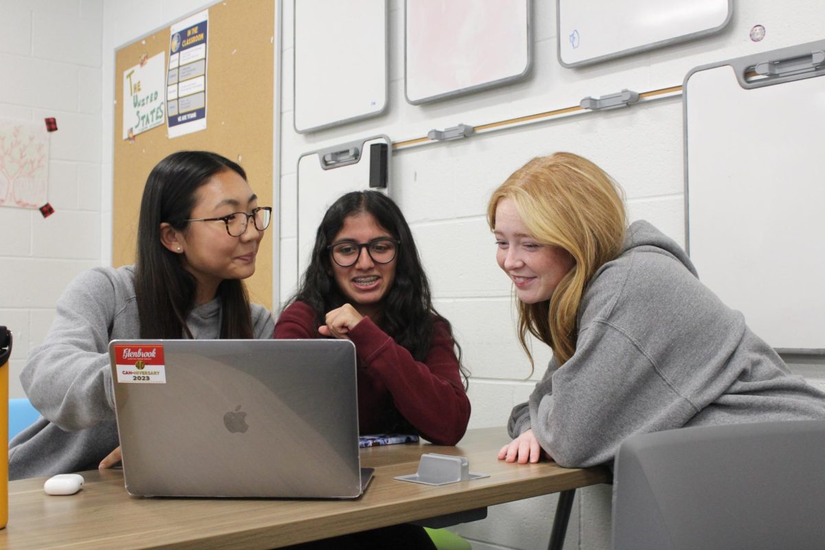 Collaborating+to+compete%3A+Debate+students+%28left+to+right%29+Sarah+Kwon%2C+Anugraha+Khishore%2C+and+Kylie+Sutton+work+together+to+prepare+for+the+upcoming+Glenbrooks+Speech+and+Debate+Tournament.