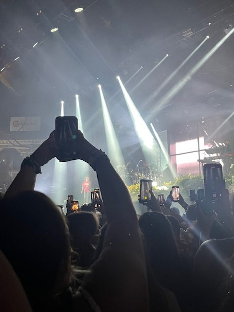 Crummy Crowds: Fans hold raise their phones raised to record Renee Rapp at her The Snow Hard Feelings Tour. This year, countless concerts have been crushed due to poor fan behavior. 