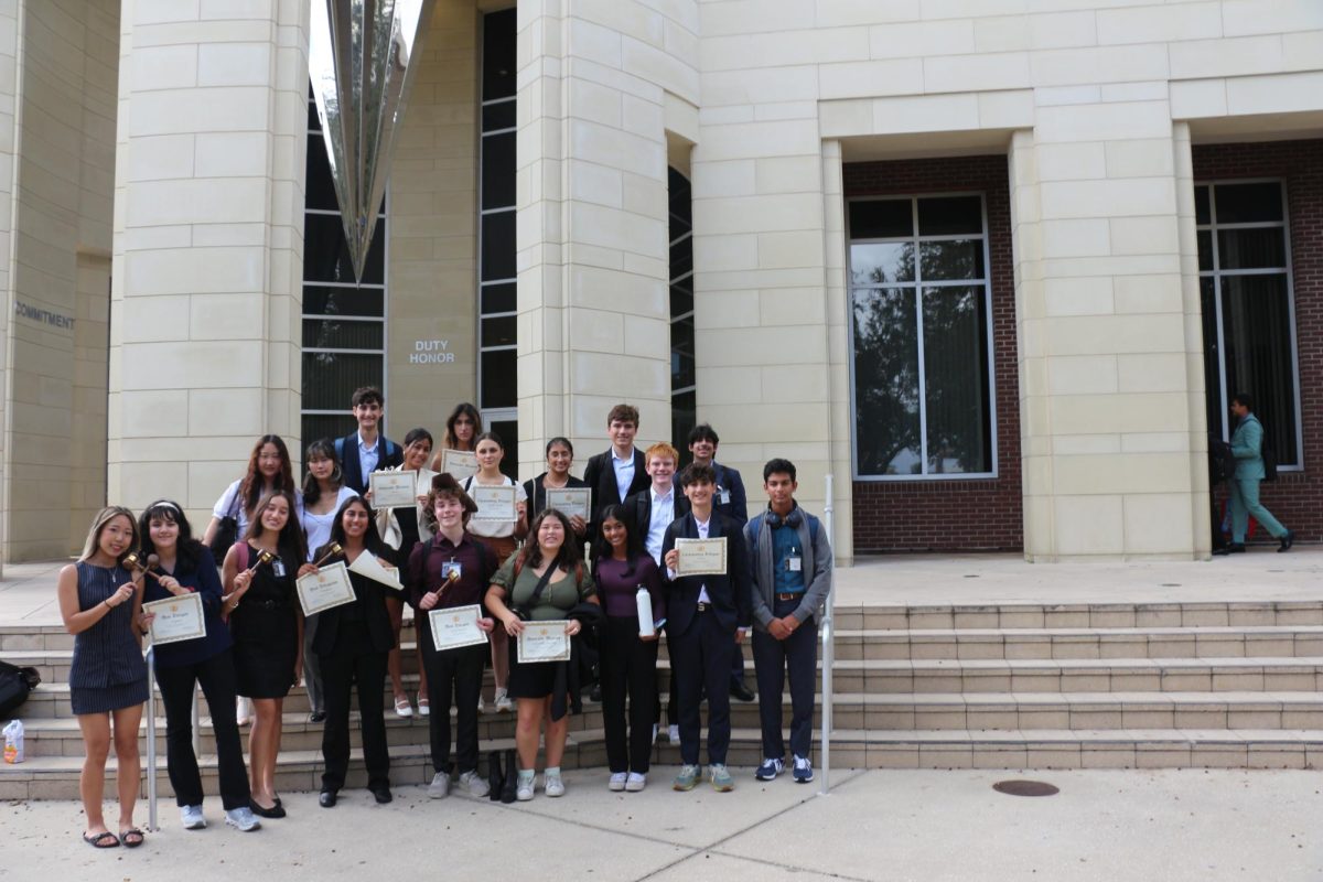 VICTORIOUS ENDING: MUN stands outside the University of Central Florida on Nov. 8 after their competition. The group recieved many individual awards
with Best Delegate going to Zenia Babool, Sean Burke, Callie Choi, Sarina Harjani, and Aleeza Kahn, Outstanding Delegate to Nuha Babool, Vahan Harabetian, and
Veronica Kolesnikov, Honorable Delegate to Ellen Llacsa, Alisha Rafiqi, and Siya Shah, and Verbal Delegate to Connor Herrington. They also received a team award
for the Best Medium Delegation.