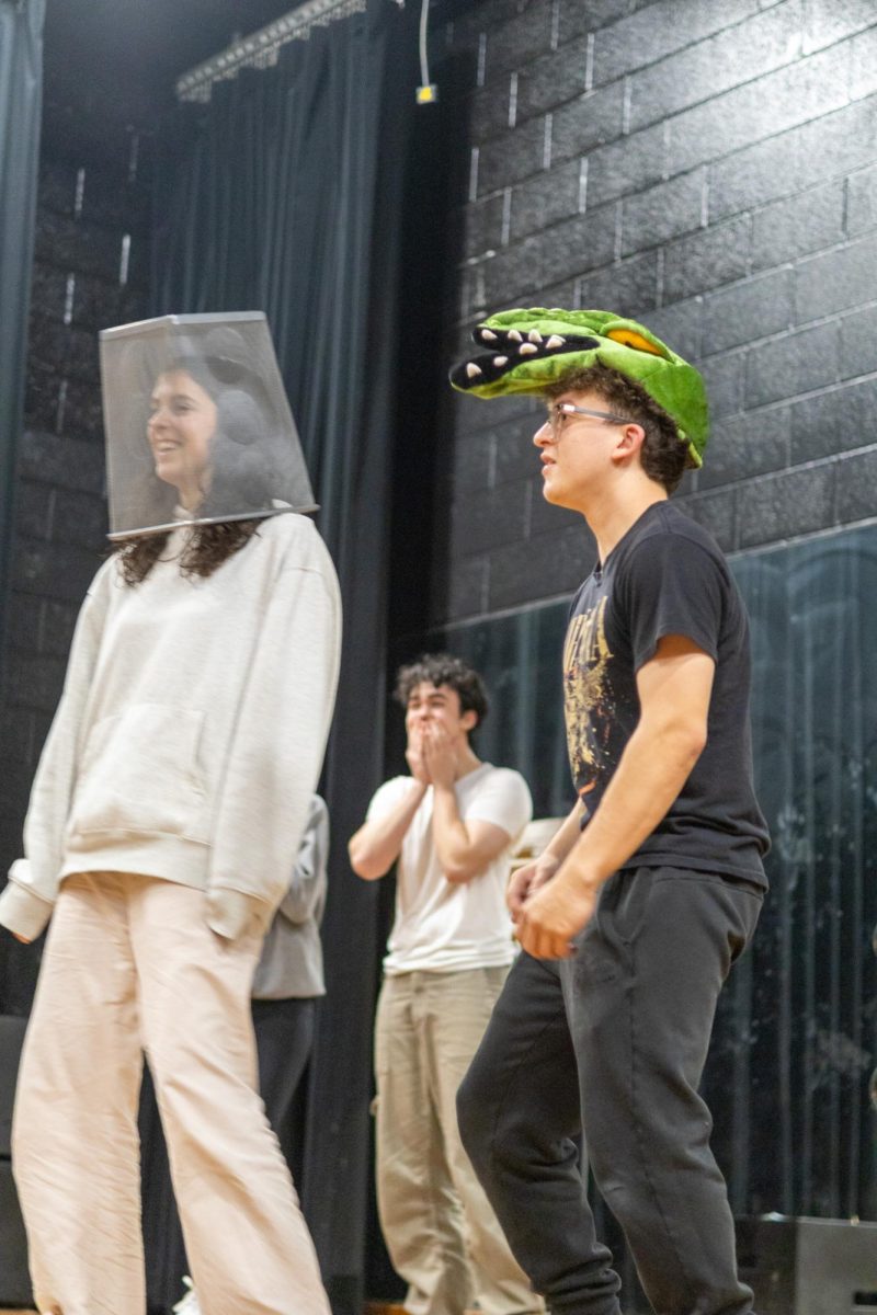 LEFT, RIGHT, CENTER: Members of the Drama Club gather in the drama room to block their scenes for their incoming production as part of the Glenbrook Story Project. [Left to right] sophomore Riley Talbot, senior Lukas House, and senior James Dravenack act out a scene called Dragon House Carnival.  